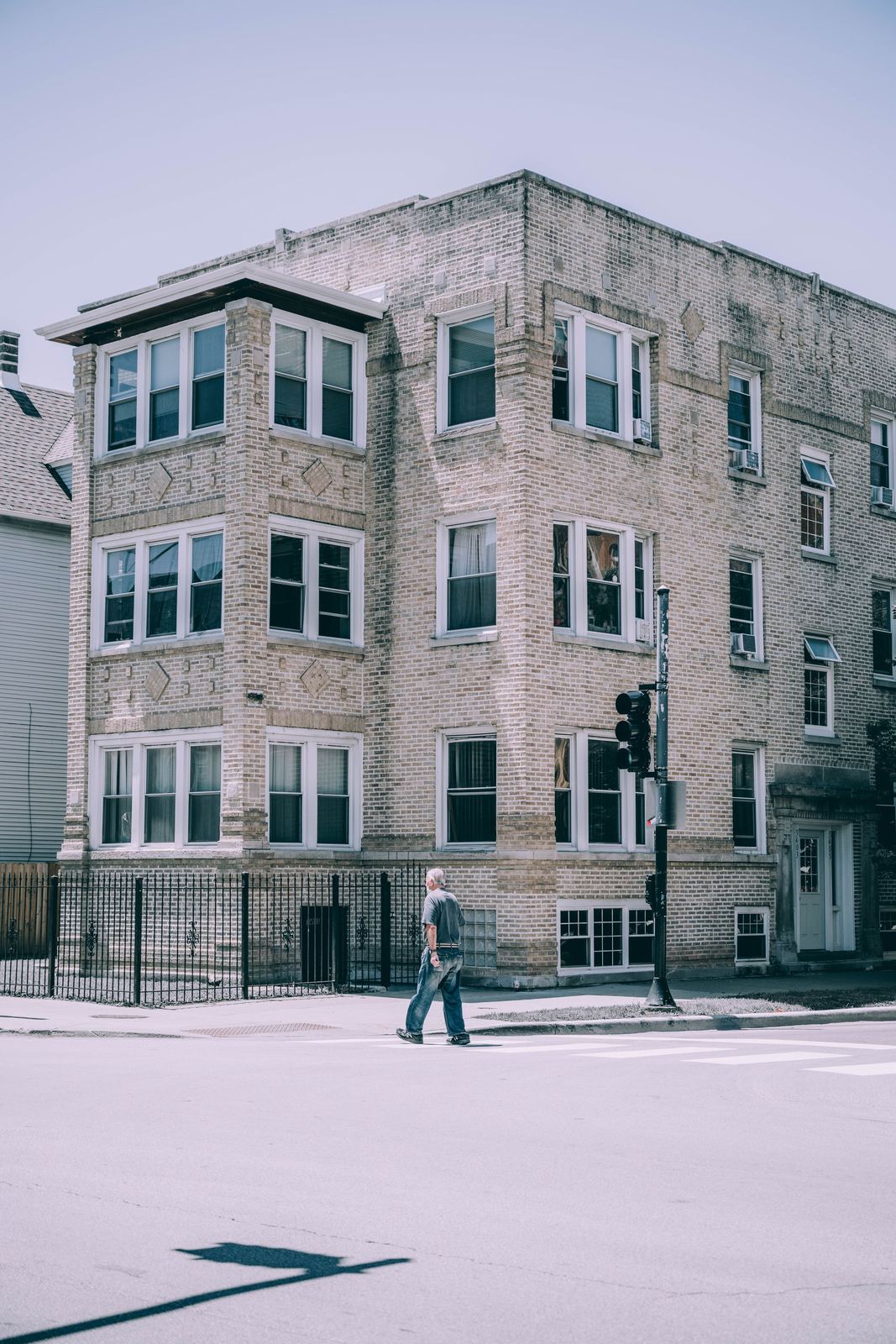 A three-story brick apartment building in Chicago
